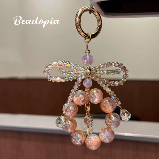 Luxury elegant phone chain with pink shiny UV beads and crystal bowknot